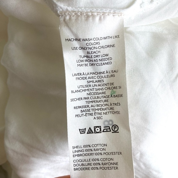 By Anthropologie EYELET ASYMMETRICAL MIDI SKIRT in Ivory - Picture 8 of 9